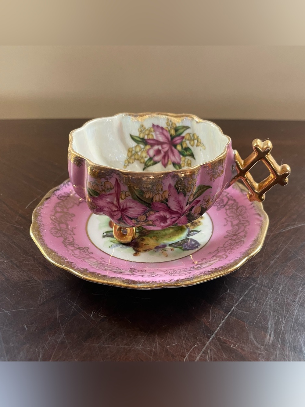 Linmark three footed lusterware Pink and Gold Teacup and Saucer
